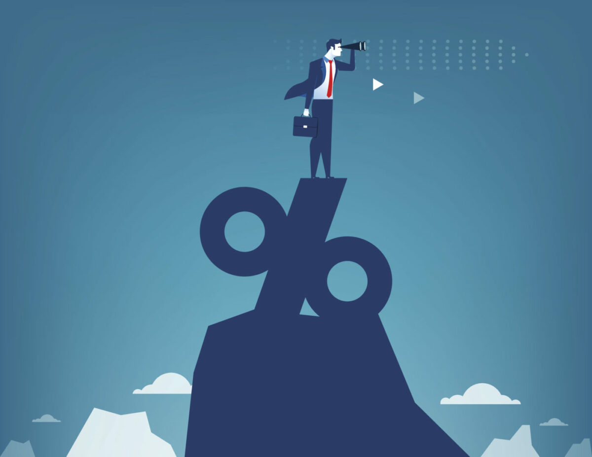Businessman with telescope standing on percent symbol